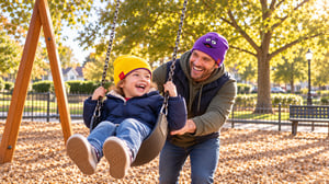 Dad and child playing wearing reversible Grimace beanie designed by Novelli